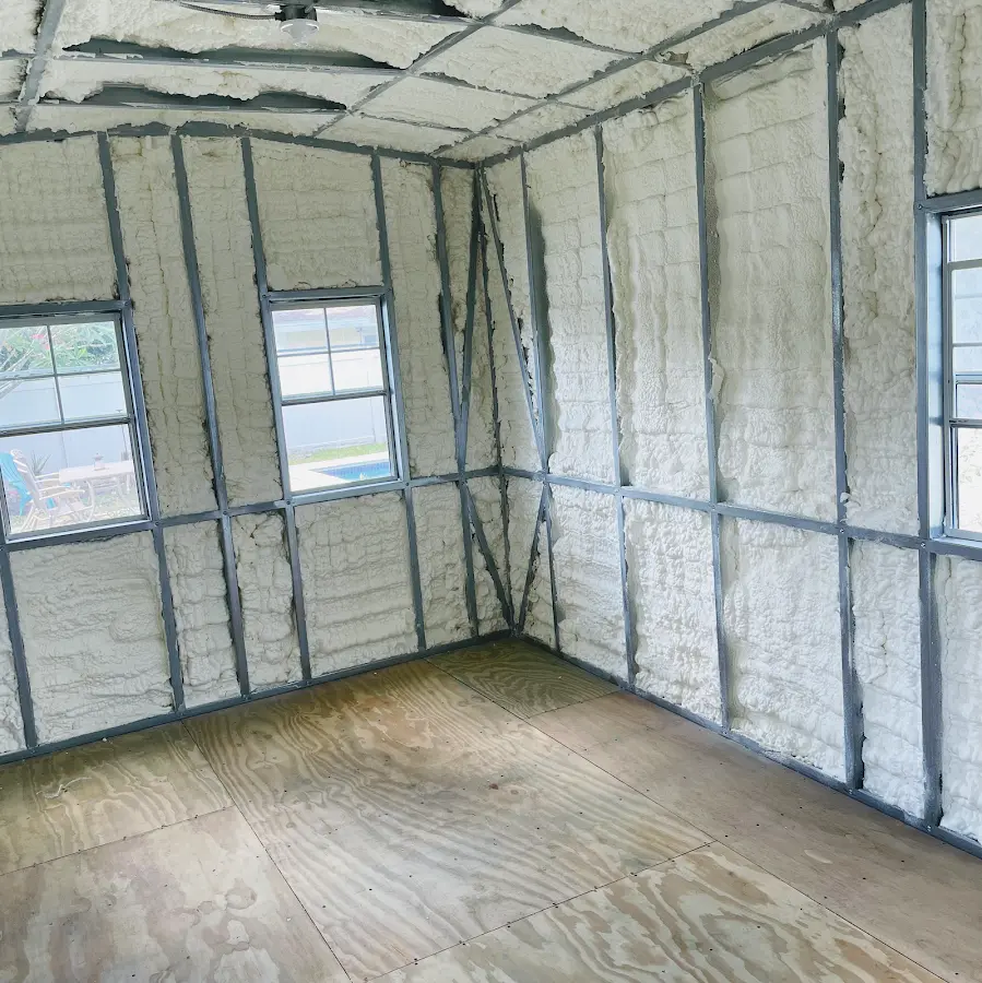 Closed-cell spray foam insulation applied to wall cavities in a residential project in Farmington Hills